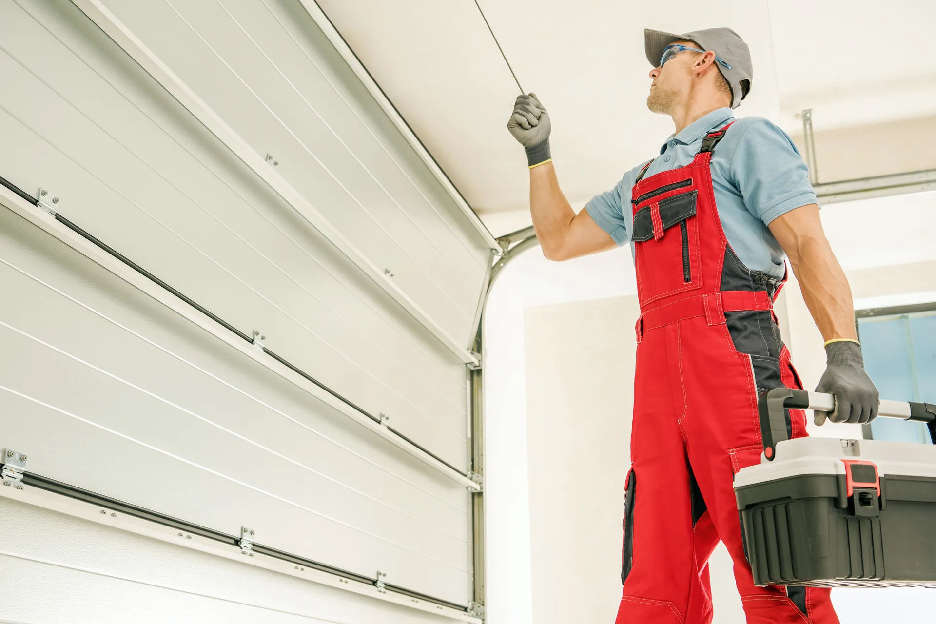 Garage door hardware and torsion spring system — professional service only